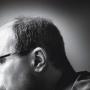 Side photo of Craig Newmark's head
