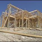 picture of a wood frame house under construction