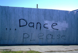 pic of wall with writing - Dance Please